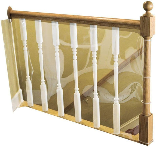 Plastic banister shield installed on stair railing to prevent children or pets from slipping through spindles