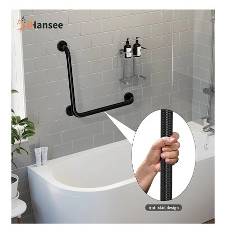 Black grab bar mounted on a bathroom wall near the tub with a close-up of a hand holding it, set against a tiled bathroom background