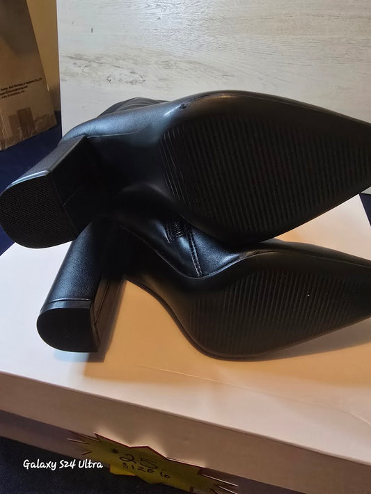 Black Boots showing the botttoms