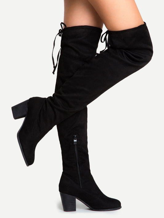 Black knee-high boots on a white background