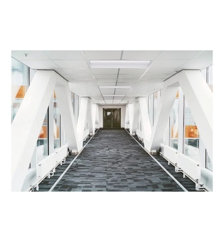 Installed troffer lights on ceiling I a hallway